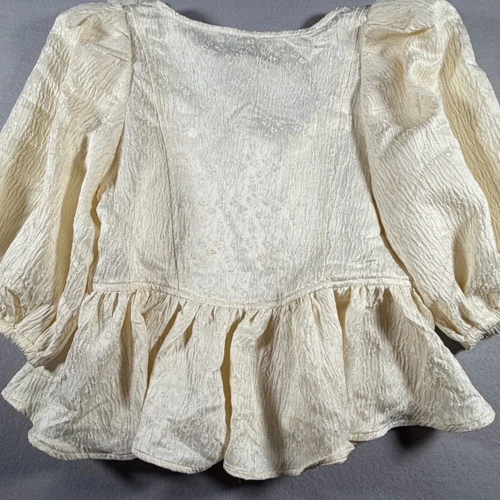 Free People NWT Ivory Textured Puff Sleeve Peplum Top Black Tie Bow Size P